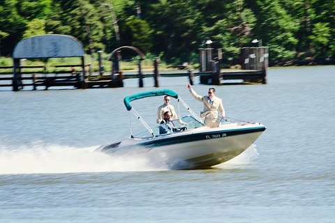 Groom arriving by boat  ||  Kathleen Hertel Photography  || Charm City Wed  ||  www.charmcitywed.com