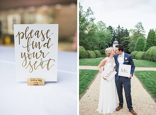Gold table cards placed inside a wine cork. The bride and groom holding Mr. & Mrs. signs at their Annapolis Wedding Venue.