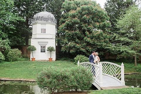Beautiful covered bridge at the ceremony location at William Paca House. Image by Tara & Renata photography 