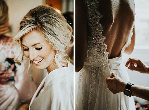 loose bridal bun and the back of the brides open back dress. Image by We Are The Cashmans