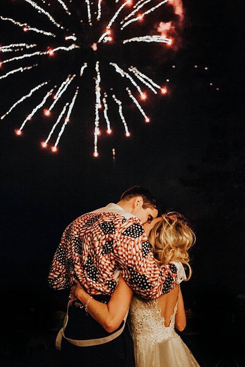 Paul in his Air Force Traditional Crazy Shirt overlooking the fireworks at the end of the wedding reception. 